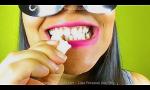 Bokep Video Girl with beautiful teeth crumpled chewed up candy