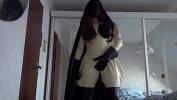 Vidio Bokep Black Booted Bitch in white Rubber Ridingsuit showing her long bullwhip to the camera mp4