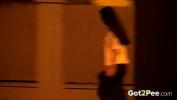 Video Bokep Walking through the city at night this hot European babe really needs to pee so pulls down her trousers and crouches next to a street light while pissing over the pavement period terbaik